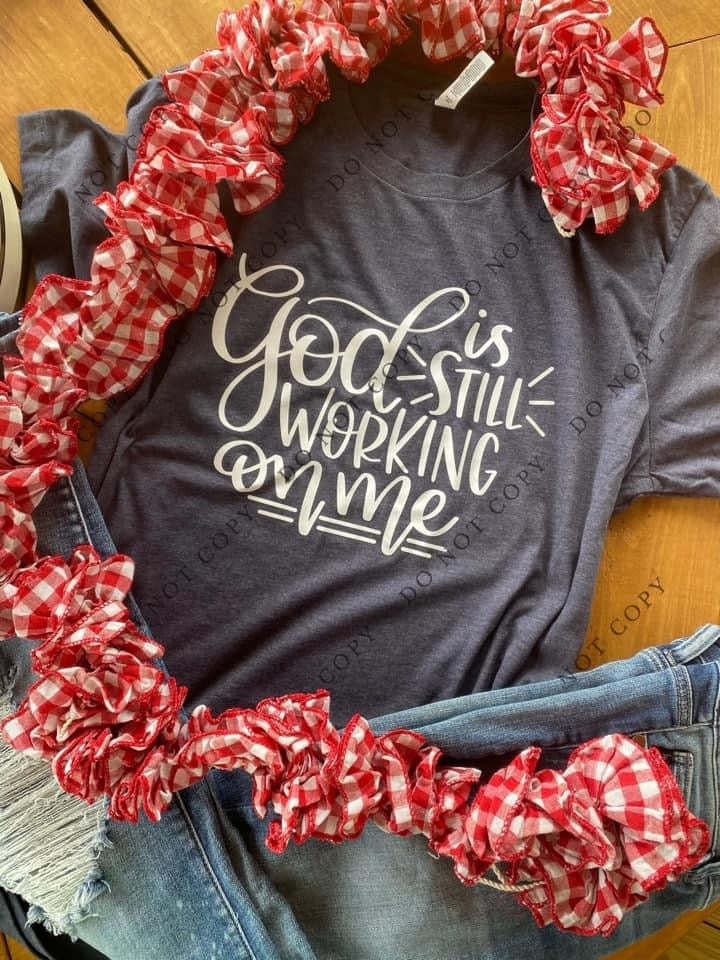 God is still working on me T-shirt